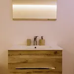 Titi Καμίνια