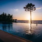 Titi Καμίνια